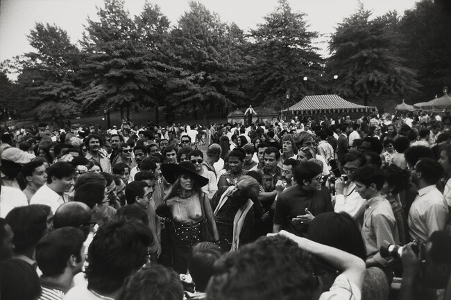 Woman with Net Shirt in Crowd, number 2, from the portfolio Garry Winogrand