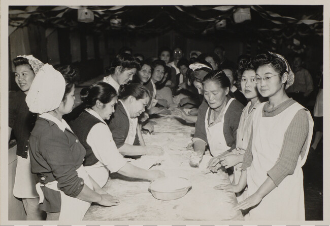 Women Preparing Baked Goods at Long Worktable, Manzanar Relocation Center, California