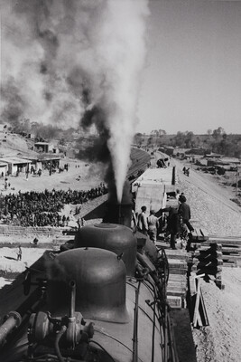 Peasants out to great the first steam train on the Alma-Ata Railroad, Mestechko Kulan Village
