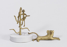 Figure of a Man Climbing Tree and a Lion