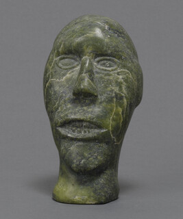Carving of a Human Head