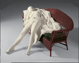 Girl on Red Wicker Couch