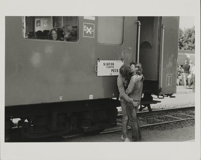Alternate image #2 of Couple Kissing at a Train Station, Hungary