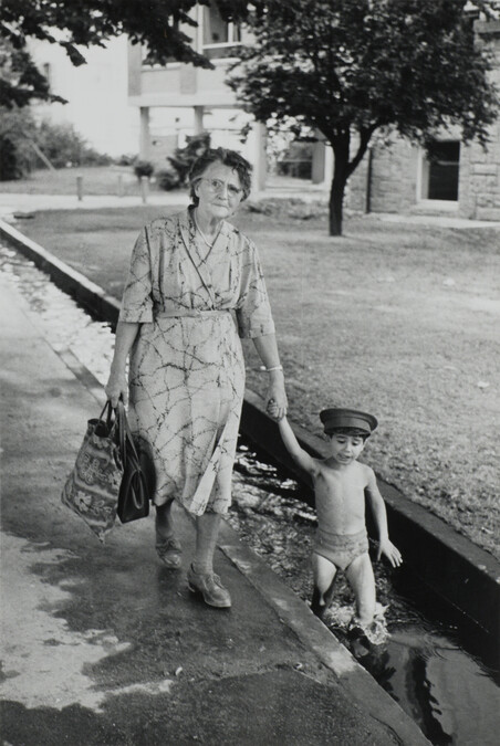 Alternate image #3 of Woman Walking with Boy in Small Canal, Freiburg, West Germany