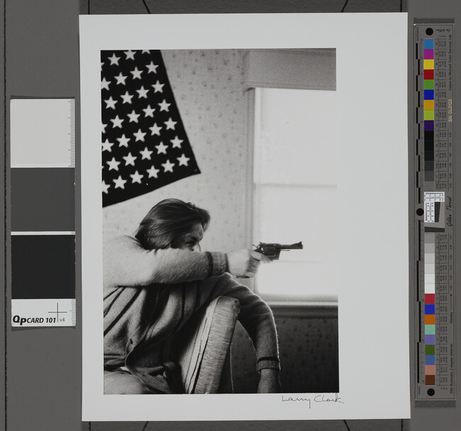 Alternate image #1 of Untitled (Man Sitting in a Room, Pointing a Gun)