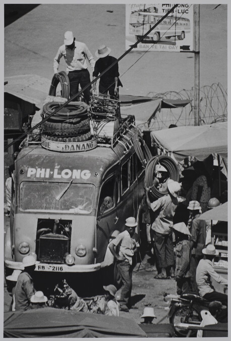 Alternate image #1 of Loading the bus, Vietnam