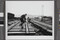 Alternate image #1 of Railworker laying down track, Baikalo-Amurskaya Railroad, Tynda Town, Amur, Russia
