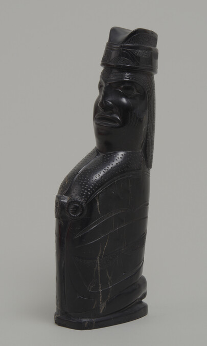 Alternate image #1 of Argillite Carving of a Kneeling Figure wearing a Ceremonial Hat and a Robe