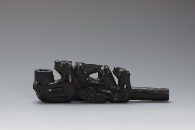 Alternate image #2 of Argillite Pipe depicting a Human Face with Goatee on the Bowl; a Bear holding the Bowl, a Raven and a Frog Facing each Other and another Bear