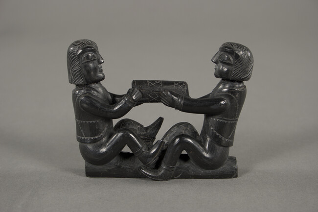 Alternate image #1 of Argillite Carving of Two Facing Seating Anglo-European Men Pulling a Cylinder
