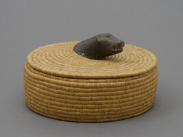Coiled basket with Soapstone Seal Head Handle