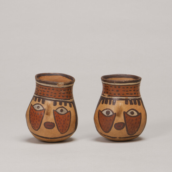 Alternate image #1 of Miniature Vessel depicting a Human Face (one of a pair)