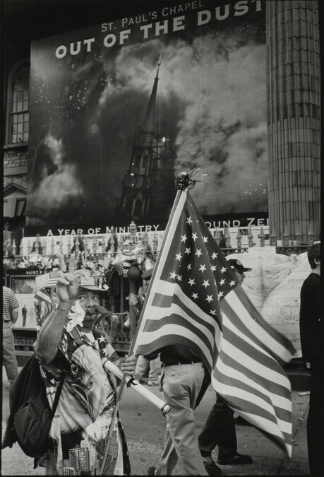 Alternate image #2 of Man with Flag Walking past St. Paul’s Chapel, New York City, USA