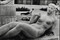 Alternate image #2 of Man Exercising behind Sculpture of Female Nude, Paris, France