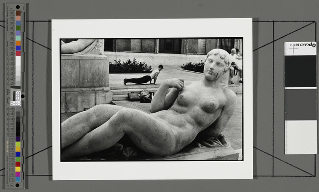 Alternate image #1 of Man Exercising behind Sculpture of Female Nude, Paris, France