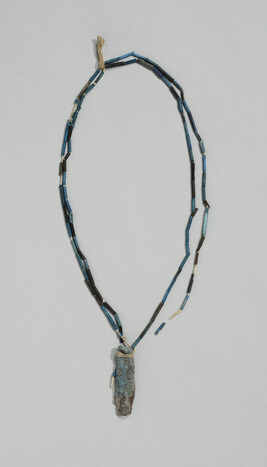 Mummy beads and amulet (assembled into modern necklace)