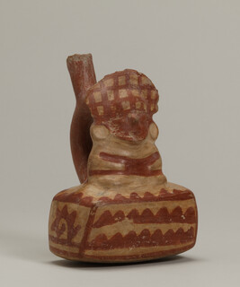 Stirrup-Spout Vessel in the form of a Seated Figure