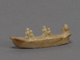 Carving of an Umiak with Five Figures