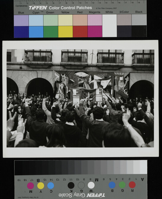 Alternate image #1 of The Basque nationalist flag and thousands of supporters reunited in front of a reproduction of Picasso's mural, Guernica, Spain, 1977