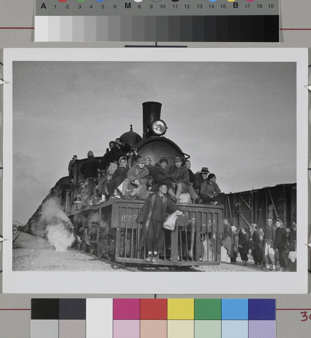 Alternate image #1 of Train overflowing with passengers.  Near the Xuzhou front, China, April, 1938