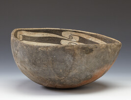 Bowl Depicting Concentric Circles with Interlocking Scrolls in a Quartered Pattern
