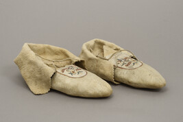 Moccasins decorated with a Floral Motif and Red Berries