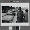 Alternate image #1 of Woman Walking Past Grain Trucks, Kuban Collective Farm, Krasnodarsky Territory