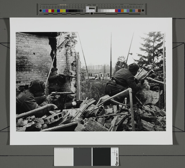 Alternate image #1 of Three soldiers firing from behind a broken building