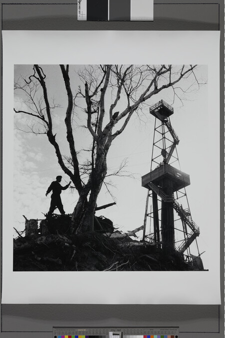 Alternate image #1 of Oilfield worker with tree and derrick, Sakhalin Island