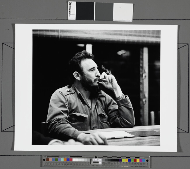 Alternate image #1 of Fidel Castro Enjoys a Cigar