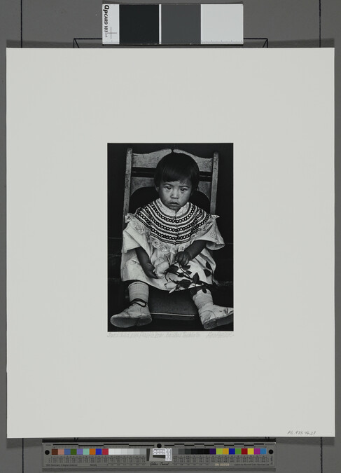 Alternate image #1 of Seated Child with Plastic Rose, Barillas, number 28, from the portfolio, Itinerant Images of Guatemala