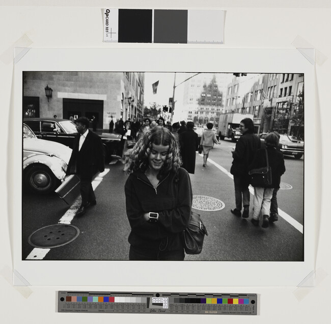 Alternate image #1 of Smiling Woman on Street, number 4, rom the portfolio Garry Winogrand