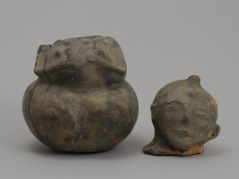 Jar in the Form of a Seated Woman (Head is a Forgery)
