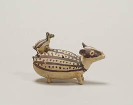 Striped Animal Figure with Small Animal on its Back