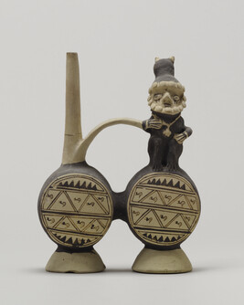 Double Chambered Drum Shaped Stirrup Spout Vessel with a Human Effigy Figure