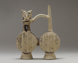 Double-chambered spout-and-bridge Vessel with Flute-playing Figure