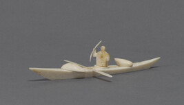 Souvenir Ivory Model Kayak with Man, Paddle, Seal, Spear and Float
