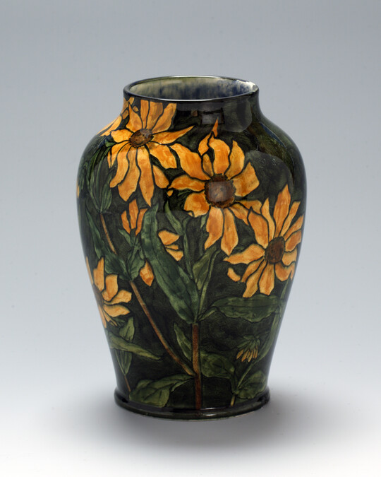 Vase with Black-Eyed Susans on a Green Ground