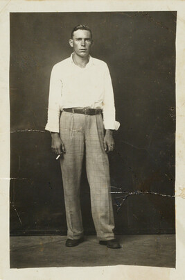 Standing Man holding a Cigarette