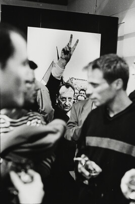 Crowd of Men with Poster of Andre Malraux in Background, Paris, France