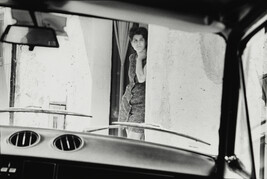 Woman Standing in Doorway, Sicily, Italy