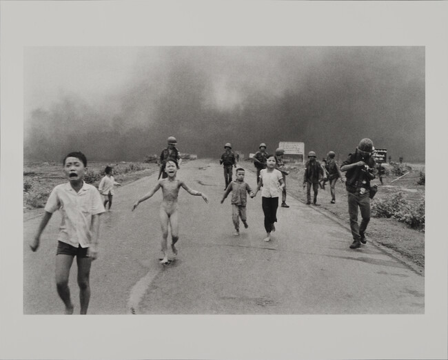 Severely burned in an aerial napalm attack, children run screaming for help down Route 1 near Trang Bang, followed by soldiers of the South Vietnamese army’s 25th Division, Trang Bang, June 8, 1972