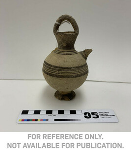 Jug - basket handle and side spout