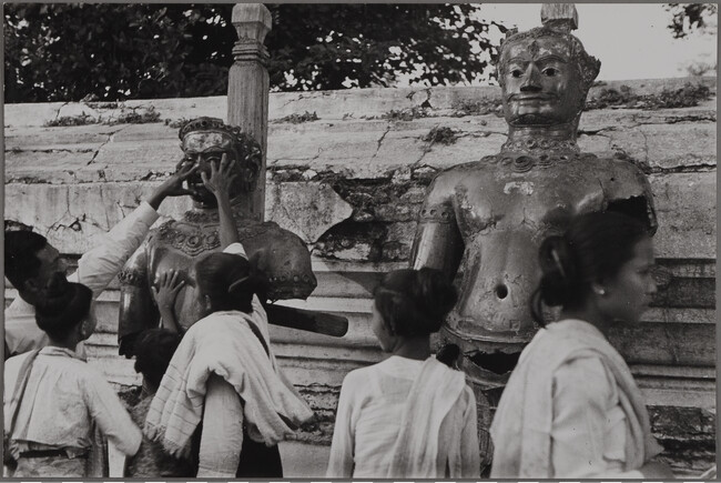 Visitors Touching Statue, Burma