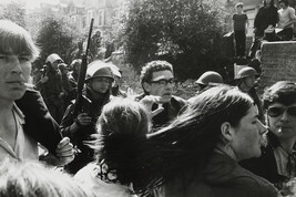 A Priest, with a Bandage on his Forehead Tries to Keep Protesters in Order and Lead a Sit-Down Strike,...