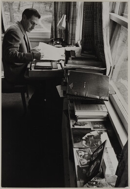 Composer Gian Carlo Menotti at his desk, Mount Kisco, New York