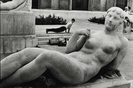 Man Exercising behind Sculpture of Female Nude, Paris, France