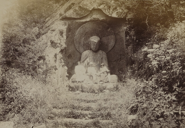 Man and two women sitting on the Rokudō Jizō. Hakone, Kanagawa Prefecture, Japan, from a Travel Photograph Album (Views of Hawaii and Japan)