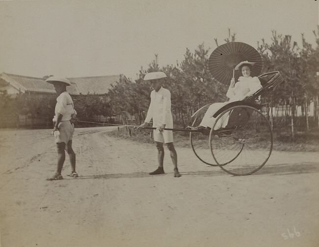 Woman with a parasol in a rickshaw pulled by two Japanese men. Kamakura, Kanagawa Prefecture, Japan, from a Travel Photograph Album (Views of Hawaii and Japan)