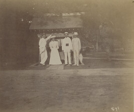 Three men and a woman in front of Hase-dera. Kamakura, Kanagawa Prefecture, Japan, from a Travel...